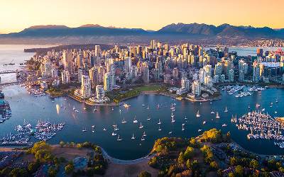 Wild BC Luxe: Heli-Ice Caves to Coastal Safaris